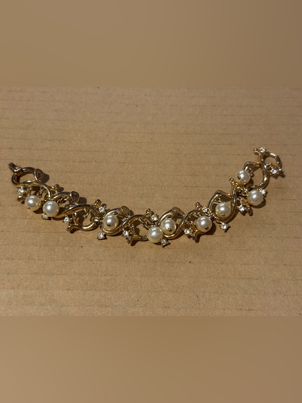 Vintage crown Trifari Gold tone faux Pearl Link Bracelet with Rhinestones